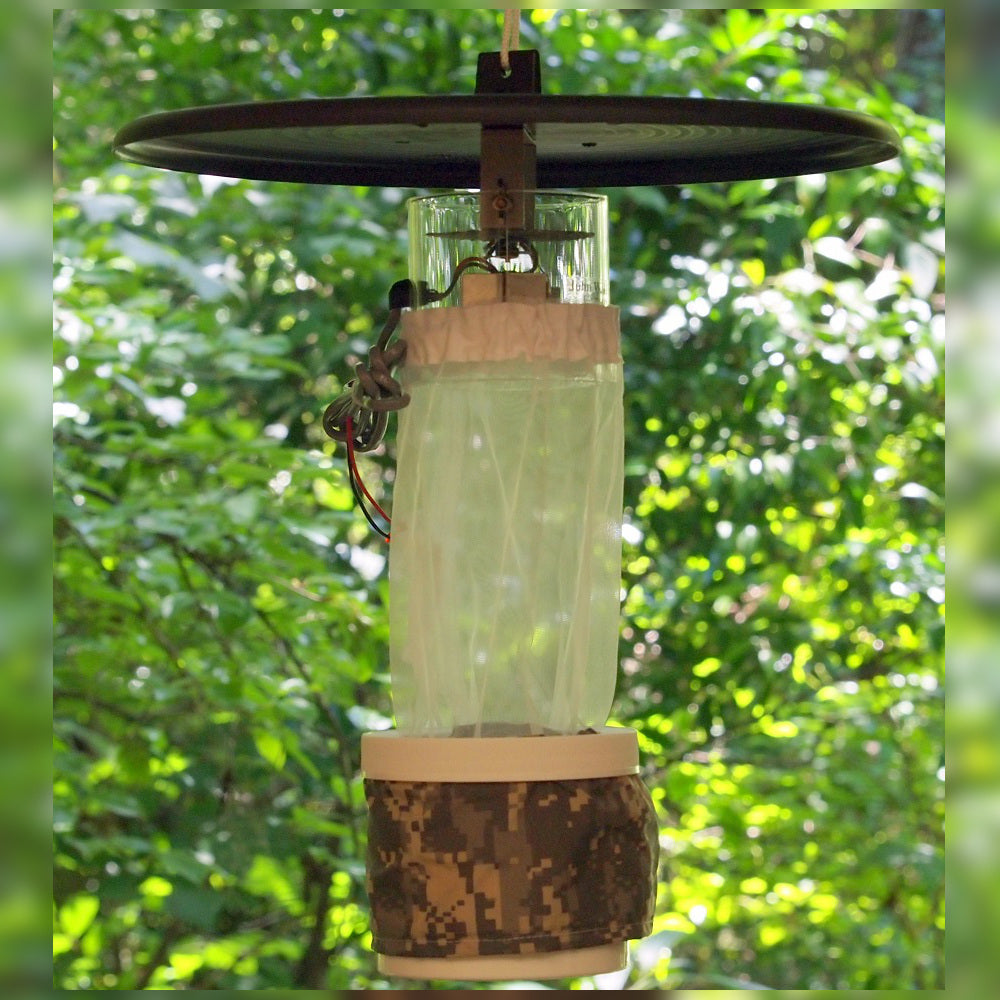 Trampa de luz en miniatura CDC con luz incandescente